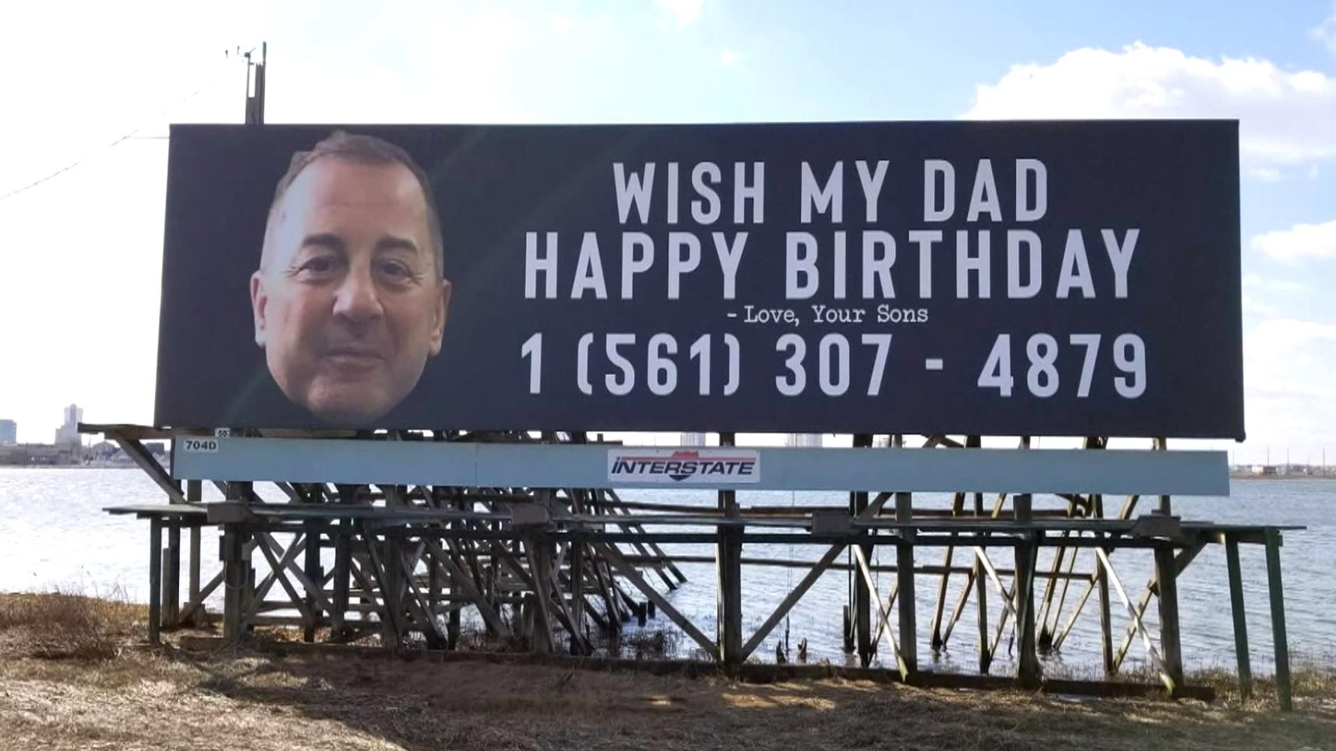 Dad flooded with birthday wishes after clever sons buy billboard