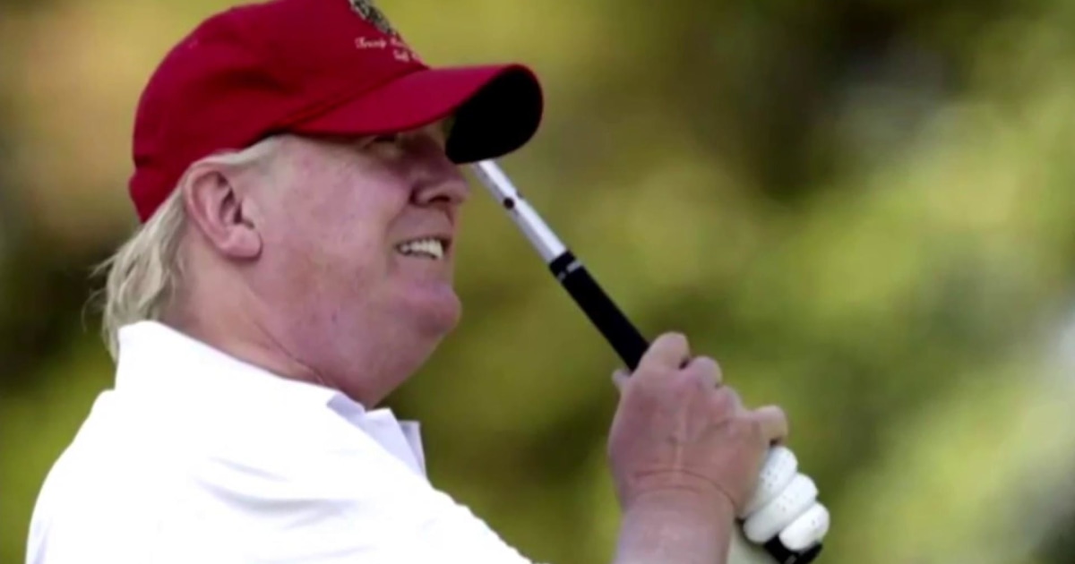 Photo of Trump wearing a MAGA hat while golfing.